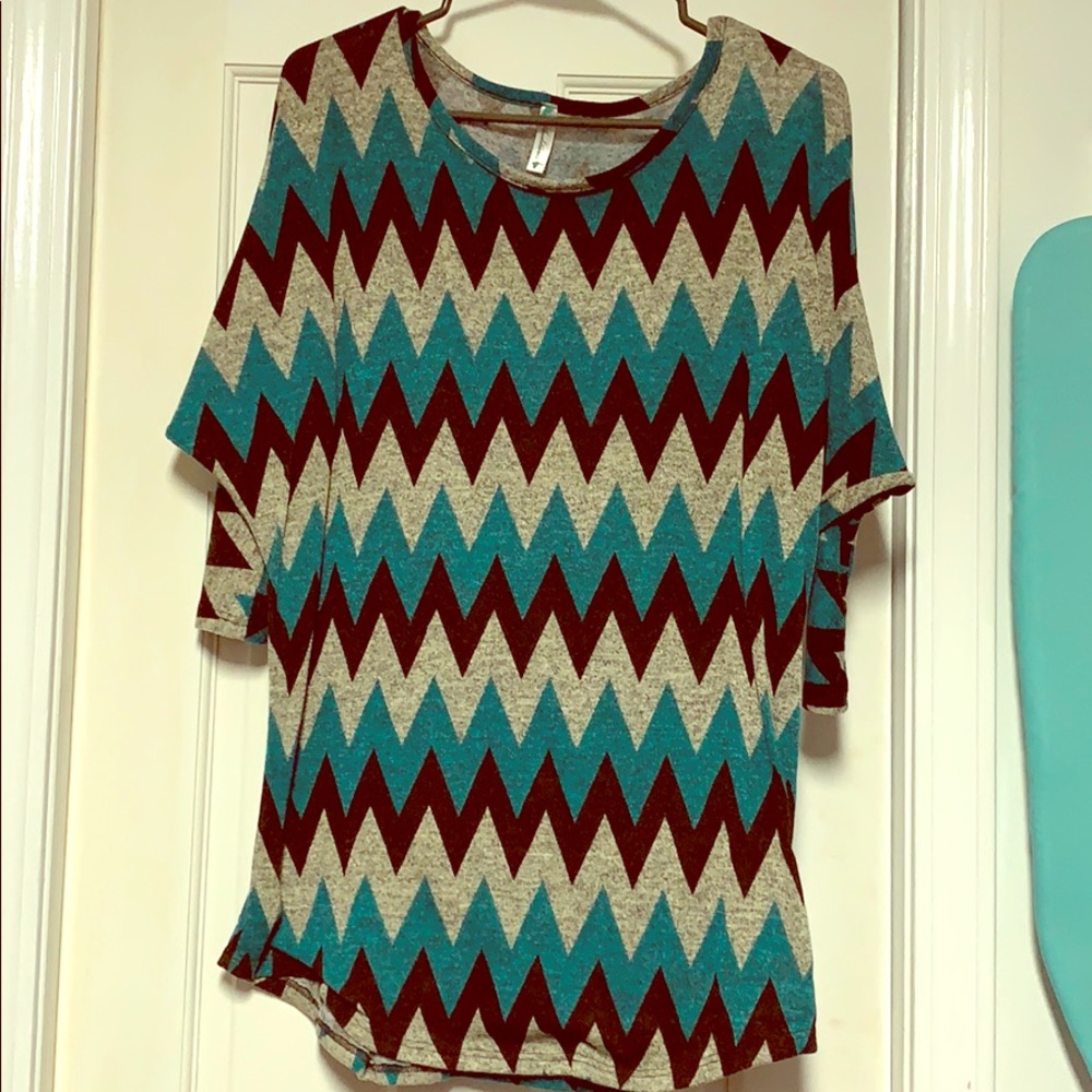 Chevron top. Black, aqua and grey. Size large